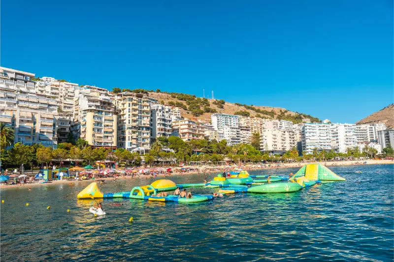 Children Playing on Inflatable Water Park Saranda Beach Albania