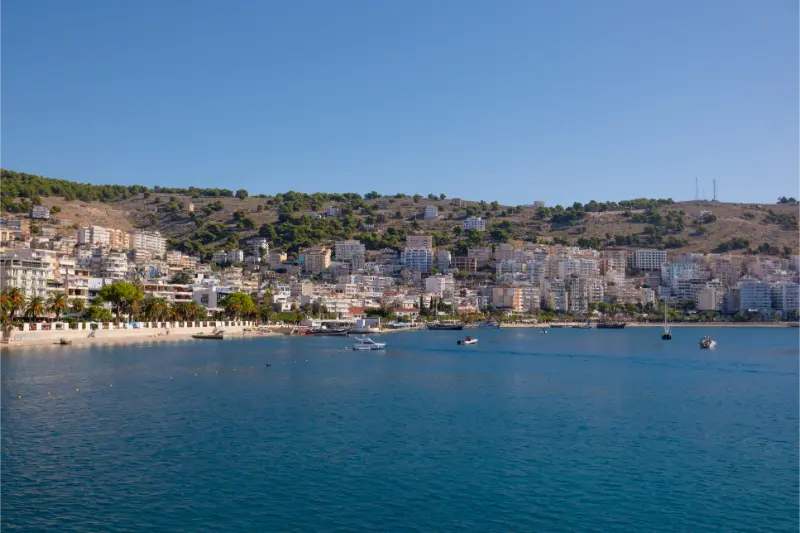 Resort Town Albania View Departing Ship Houses Mountains Port Town Saranda